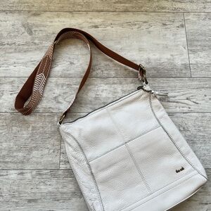 The Sak Lucia Leather Adjustable Crossbody with Brown Woven Strap Stone Color